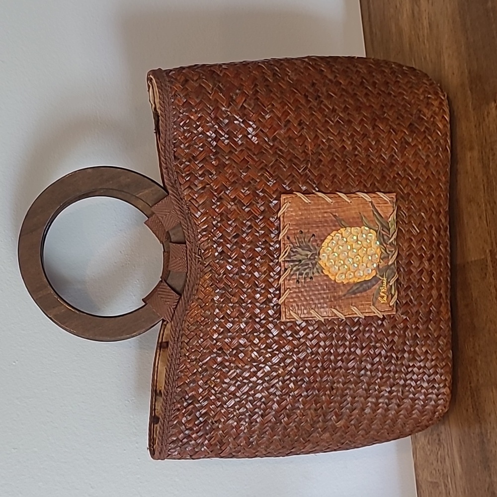 Sun N Sand woven straw brown purse pineapple design by artist Paul Brent